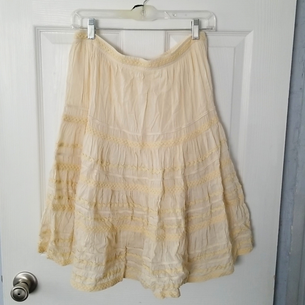 Cream colored embroidered skirt